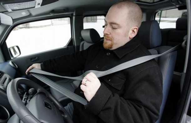 General Motors’ Automatic Seat Belts