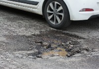 pothole-cracks-open_manhole project thumbnail